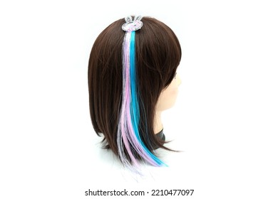 Female Mannequin With Hair Band Of Colored On Head. High Quality Photo