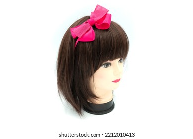 Female Mannequin With Hair Band Of Colored On Head. High Quality Photo