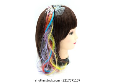 Female Mannequin With Hair Band Of Colored On Head. High Quality Photo