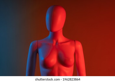 Female Mannequin Isolated Against Colorful Background. Color Gel Photography.