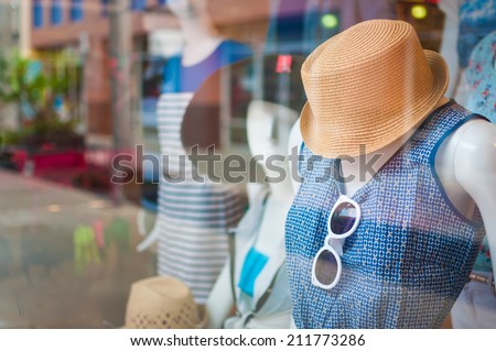 Female mannequins inside a fashion house