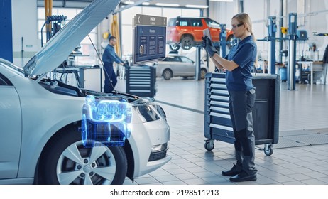 Female Mechanic Uses a Tablet Computer with an Augmented Reality Diagnostics Software. Specialist Inspecting Car's V6 Engine in Order to Find Broken Components. Hi-tech Modern Car Service. - Powered by Shutterstock