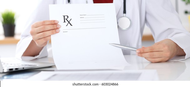 Female Medicine Doctor Hand Hold Clipboard Pad And Give Prescription To Patient Closeup. Panacea And Life Save, Prescribe Treatment, Legal Drug Store, Contraception Concept