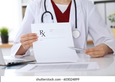 Female Medicine Doctor Hand Hold Clipboard Pad And Give Prescription To Patient Closeup. Panacea And Life Save, Prescribe Treatment, Legal Drug Store, Contraception Concept