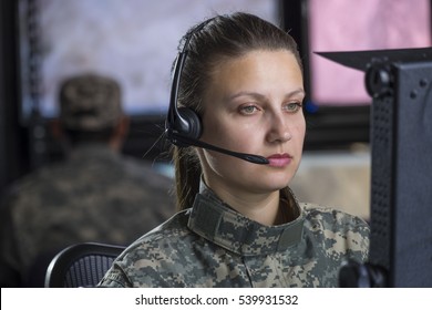 Female Military Drone Operator On Computer