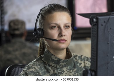 Female Military Drone Operator On Computer