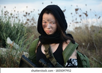 A Female Militia Soldier In A Post Apocalyptic Desert Wasteland. Urban Combat And Wasteland 