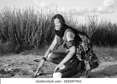 A Female Militia Soldier In A Post Apocalyptic Desert Wasteland. Urban Combat And Wasteland 