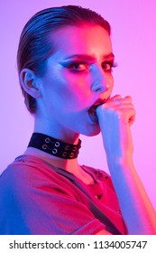 Female Model In Studio, Coloured Gel Lighting, Photography Lighting Technique. Gels And Color. Short Hair And Chocker, Edgy Alternative Fashio Look