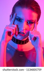 Female Model In Studio, Coloured Gel Lighting, Photography Lighting Technique. Gels And Color. Short Hair And Chocker, Edgy Alternative Fashio Look