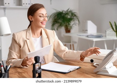 Female Notary Public Working In Office