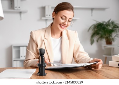 Female Notary Public Working In Office