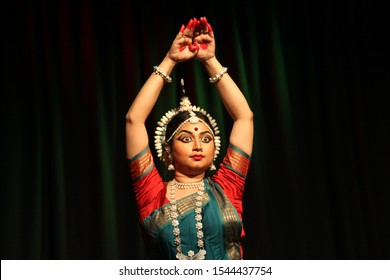 A Female Odissi Dancer Looks At Lord Krishna At The Ente Kudumbam On October 27,2019 At Shukra Hall,Bengaluru