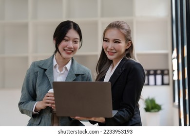 Female office worker business suit working together with friends in office, successful and agreement concept - Shutterstock ID 2233953193
