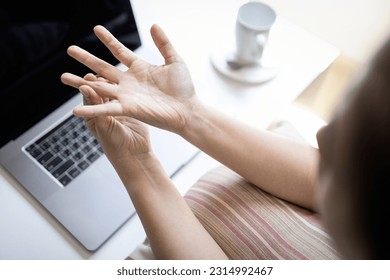 Female office worker suffering from trigger finger disease,painful in fingers and wrist,hurt the hand,health problems,Concept of Trigger Finger,Digital Flexor Tenosynovitis or Stenosing Tenosynovitis