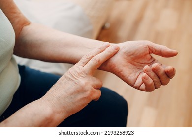 Female Old Hand Measure Check Arm Pulse. Elderly Woman Heart Health.