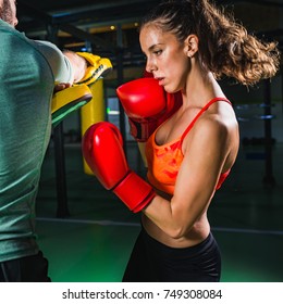 Female On Boxing Class With Her Male Instructor