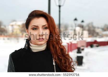 female on street lights snow