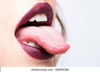 Female Open Smiling Mouth With Sexy Lips Purple Lipstick And Tongue