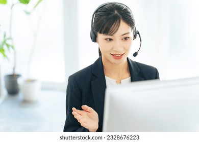 Female operator working in office. Call center. Customer support. - Shutterstock ID 2328676223