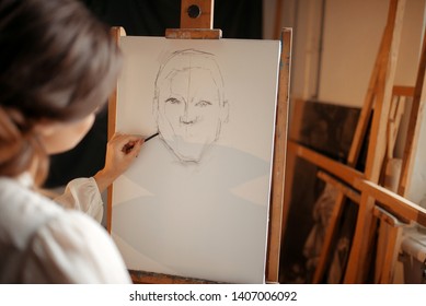 Female Painter In Studio, Pencil Sketch On Easel