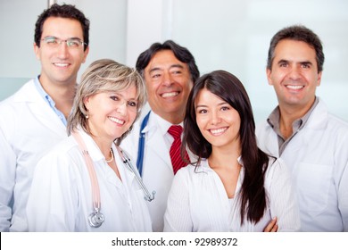 Female Patient With A Group Of Doctors At The Hospital