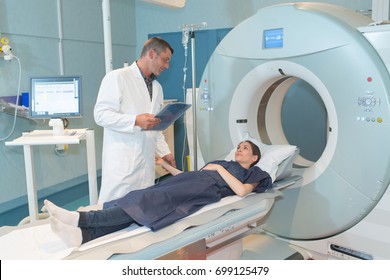 female patient talking to doctor before mri scan