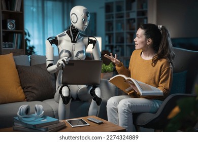 A female person enjoying her smart living room, studying with an AI droid companion and laptop.