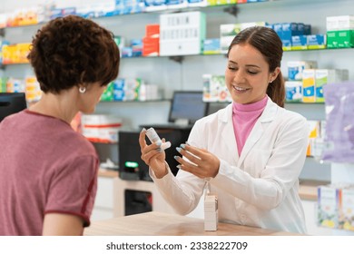 A female pharmacist talking with a female customer about a products choice - Powered by Shutterstock