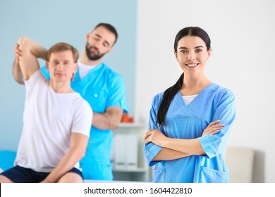 Female Physiotherapist In Rehabilitation Center