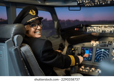 Female pilot on board the aircraft. Caucasian woman in flight simulator. - Powered by Shutterstock