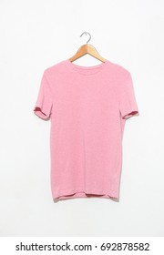 Female Pink Shirt On Hanging Isolated

