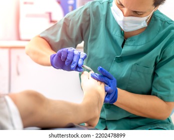 Female Podiatrist Doing Chiropody In Her Podiatry Clinic. Selective Focus