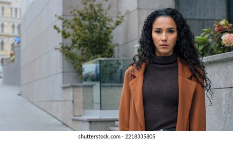 Female Portrait Beautiful Latin Business Woman Look Over Shoulder Young Hispanic Serious Girl Brunette Student Model Tourist Turn Turning Standing City Background Looking At Camera Arms Crossed Posing