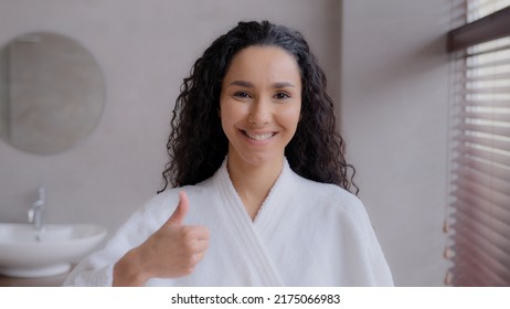 Female Portrait Young Happy Hispanic Woman Client Standing In Bathroom Or Beauty Parlor Smiling Showing Thumb Up Gesture Approval Great Result Beautiful Girl Advertises Recommends Cosmetology Service