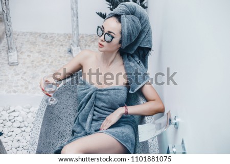 Female posing on spa salon, massage, oil, relax, skin clean, body, beauty face, drinking cocktail, sunglasses fashion, bathroom, cute