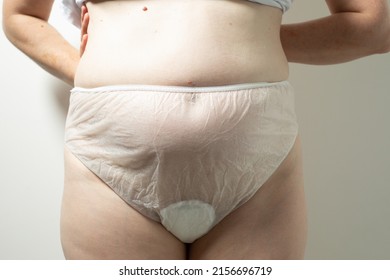 Female Postpartum Belly In Disposable Underpants, Hygiene