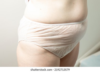 Female Postpartum Belly In Disposable Underpants, Hygiene