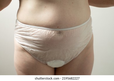 Female Postpartum Belly In Disposable Underpants, Hygiene