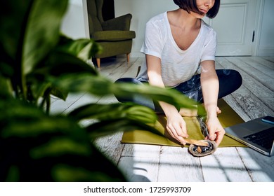 Female Practicing Yoga In Quarantine At Home. National Yoga Day. Healthy Living In Lockdown. Using For Meditation Palo Santo Sticks.