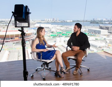 Female Presenter Asking A Famous Celebrity At Tv Studio