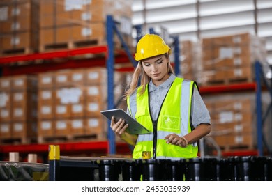 Female professional using tablet quality checking car parts worker in warehouse. Supervisor import-export shipping transportation, logistic business factory concept. - Powered by Shutterstock