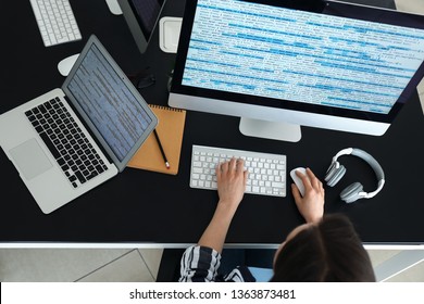 Female Programmer Working In Office