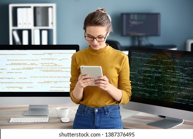 Female Programmer Working In Office