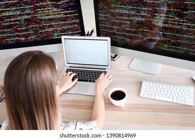 Female Programmer Working In Office