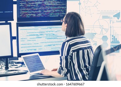 Female programmer working in office