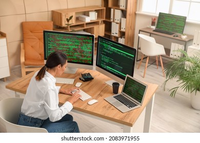 Female programmer working in office