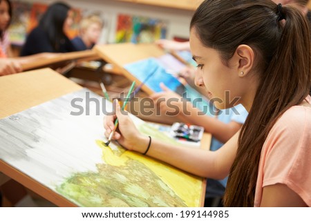 Female Pupil In High School Art Class
