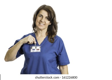 A Female Radiology Nurse Putting On A Badge That Holds Her Film Markers.