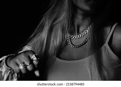 Female Rapper Showing Fist Over Black Background